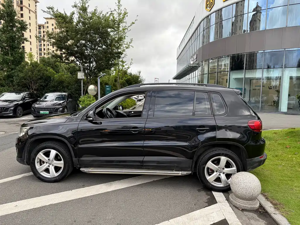 Volkswagen Tiguan 2013 — фото 2
