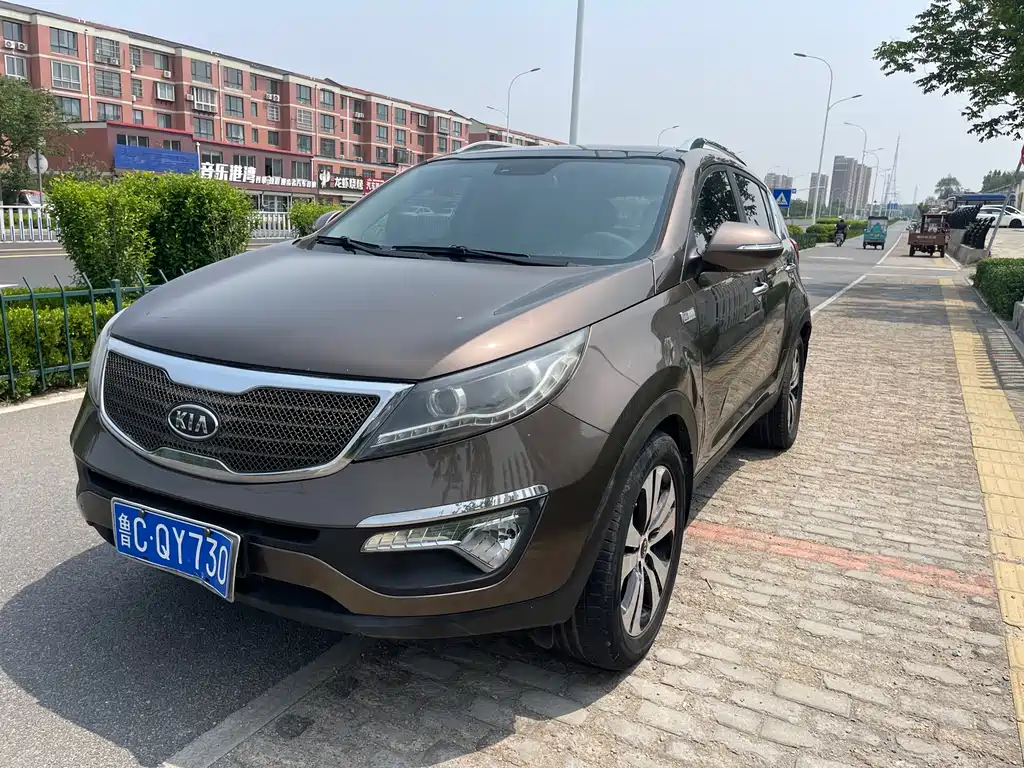 Kia Sportage 2014 — фото 1