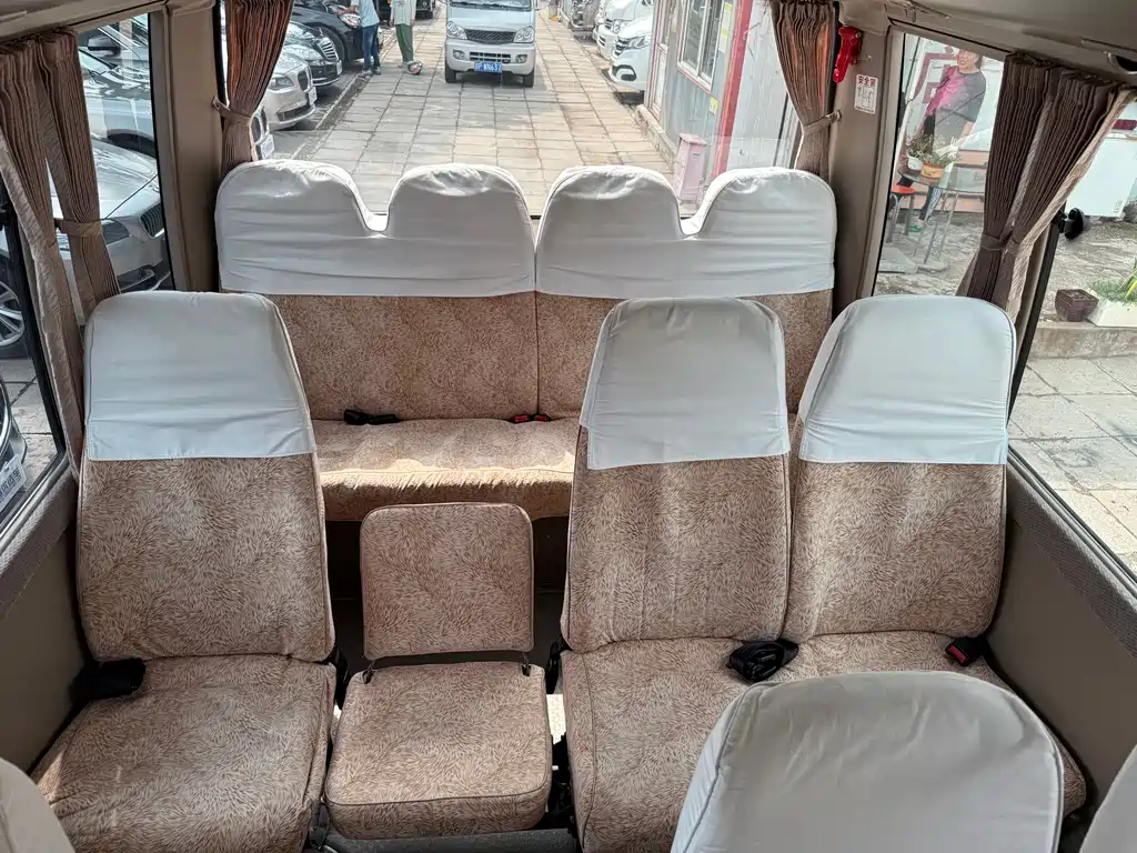 Toyota Coaster 2011 — фото 22
