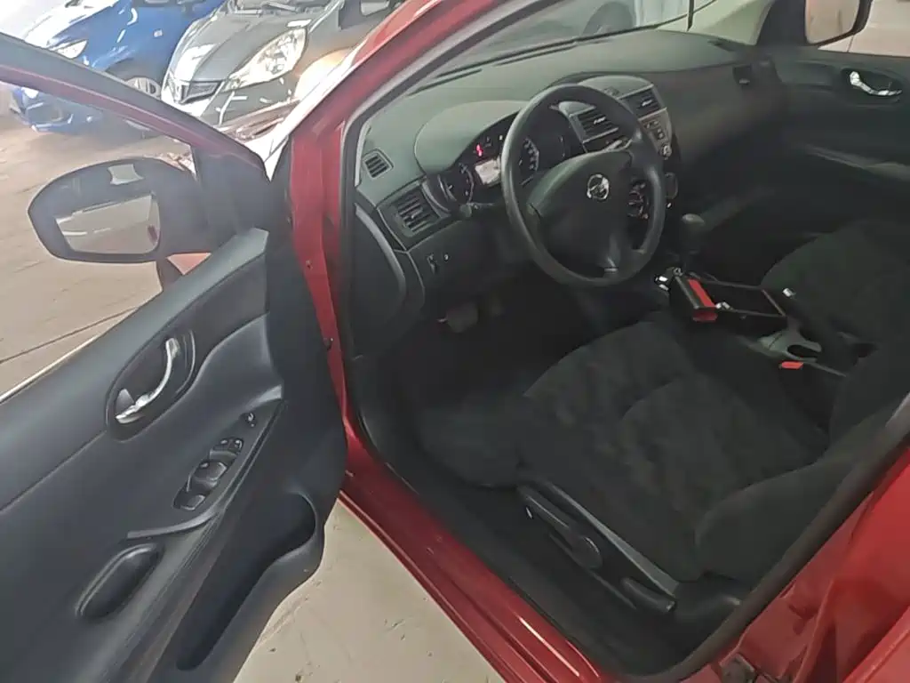 Nissan Tiida 2015 — фото 16