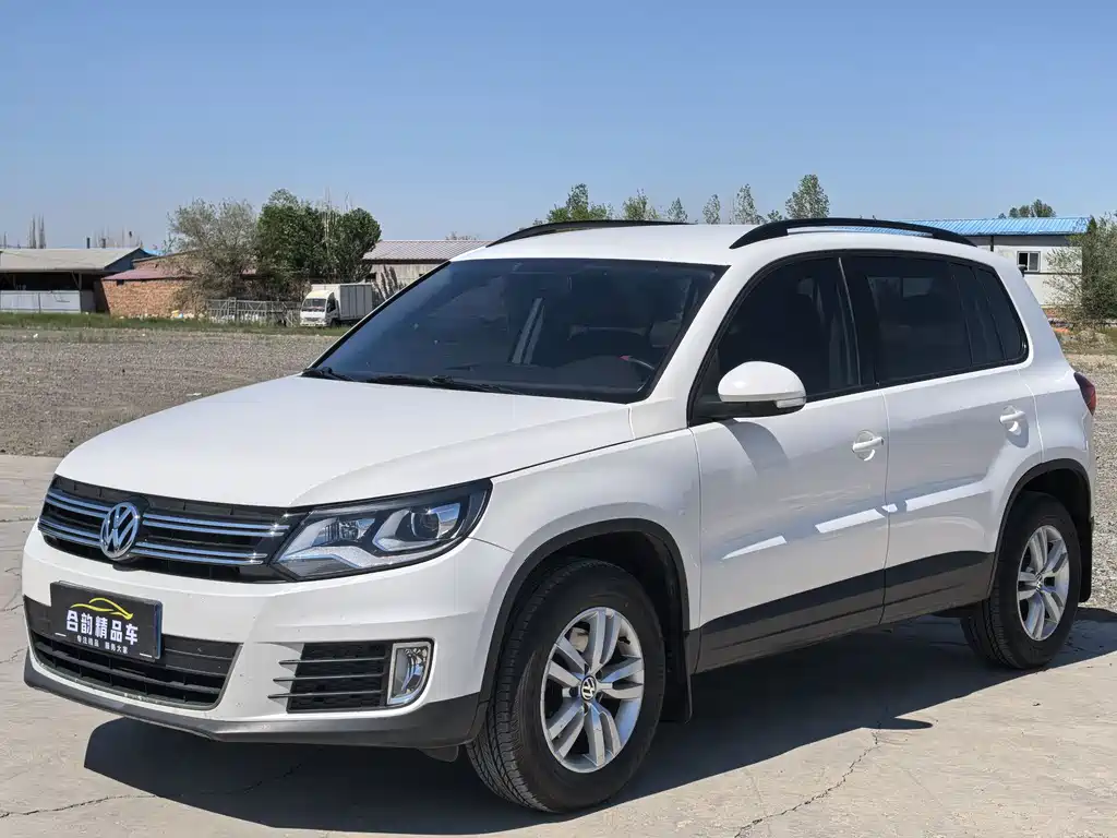 Volkswagen Tiguan 2014 — фото 1