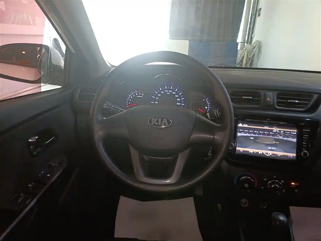 Kia K2 2014 — фото 11