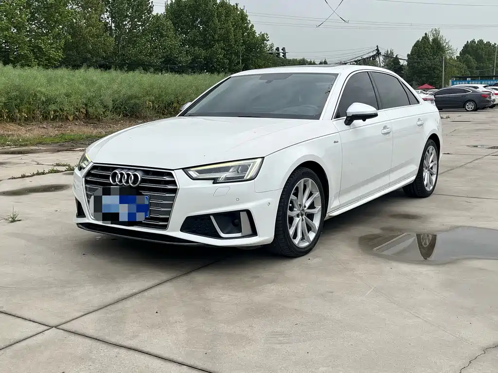 Audi A4L 2019 — фото 1