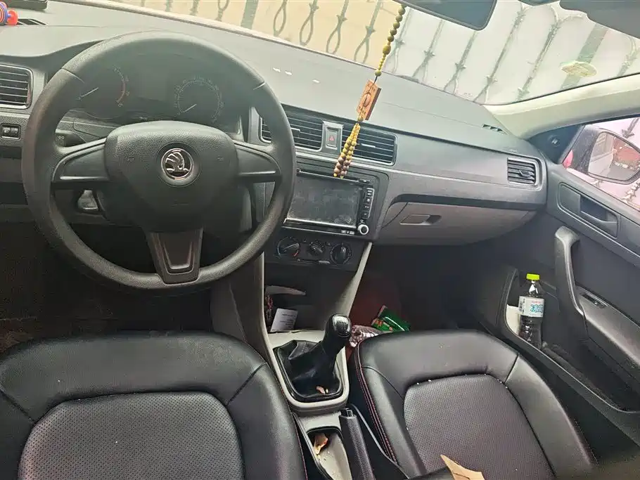 Skoda Rapid 2014 — фото 12