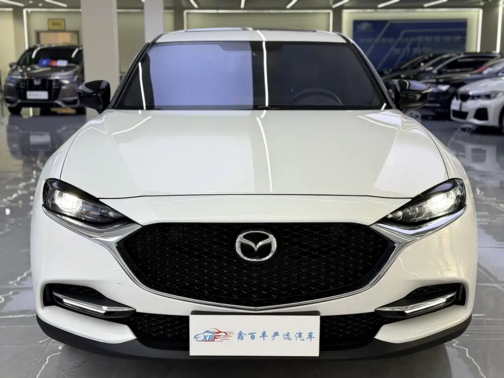 Mazda CX-4 2023 — фото 2