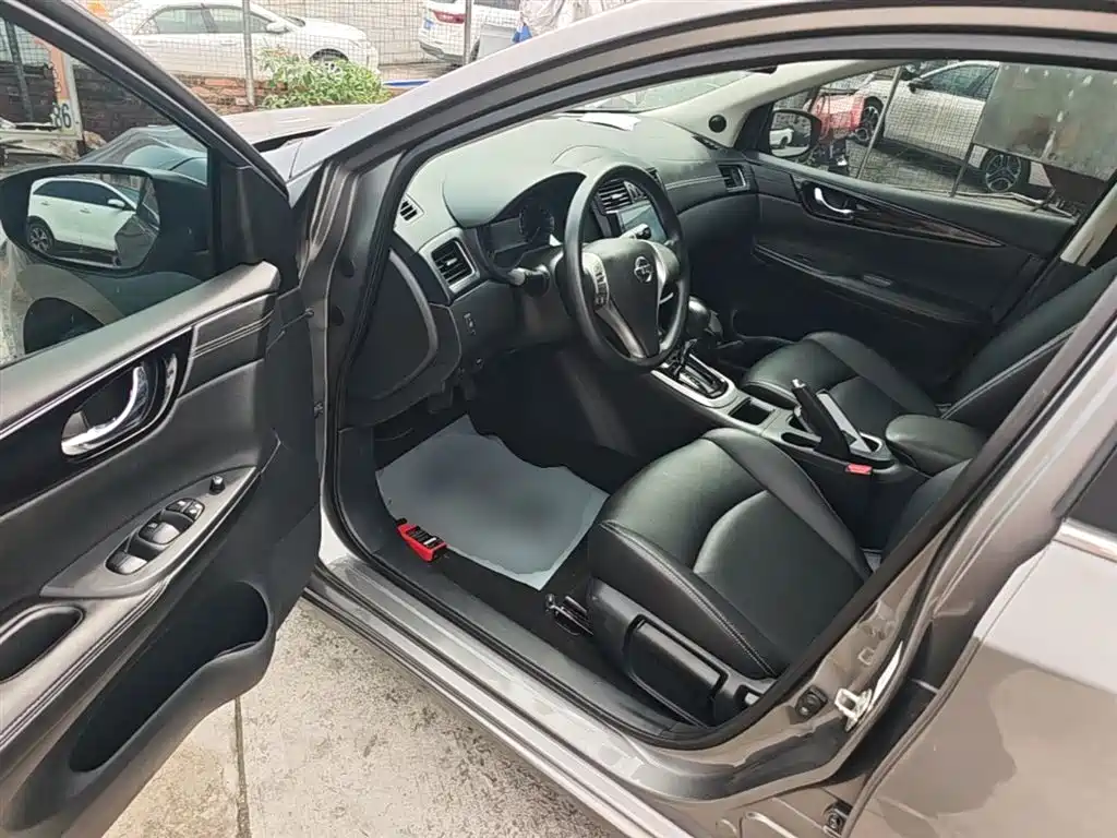 Nissan Tiida 2018 — фото 16