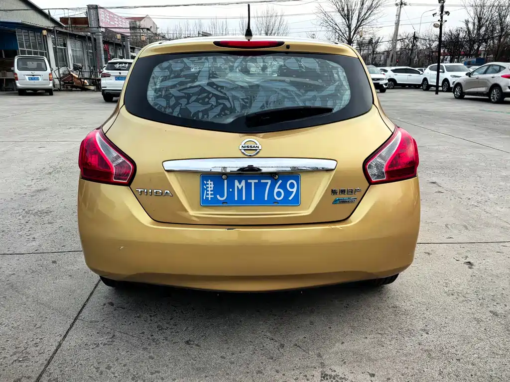 Nissan Tiida 2015 — фото 6