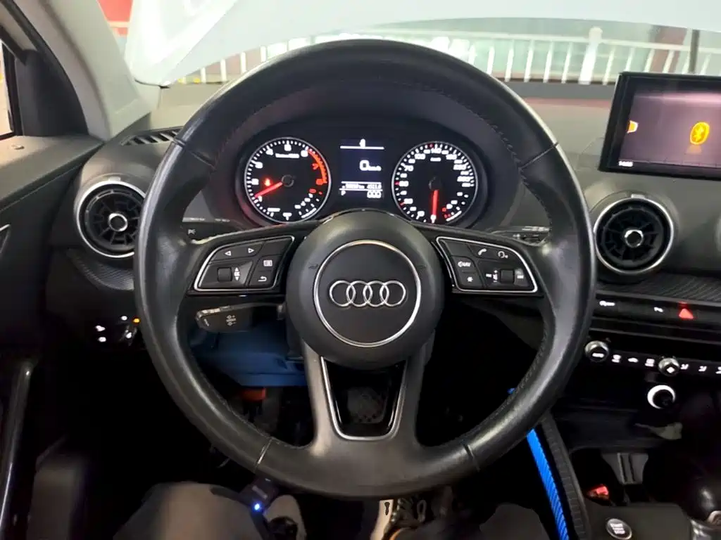 Audi Q2L 2021 — фото 11