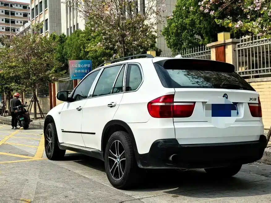 BMW X5 2009 — фото 7