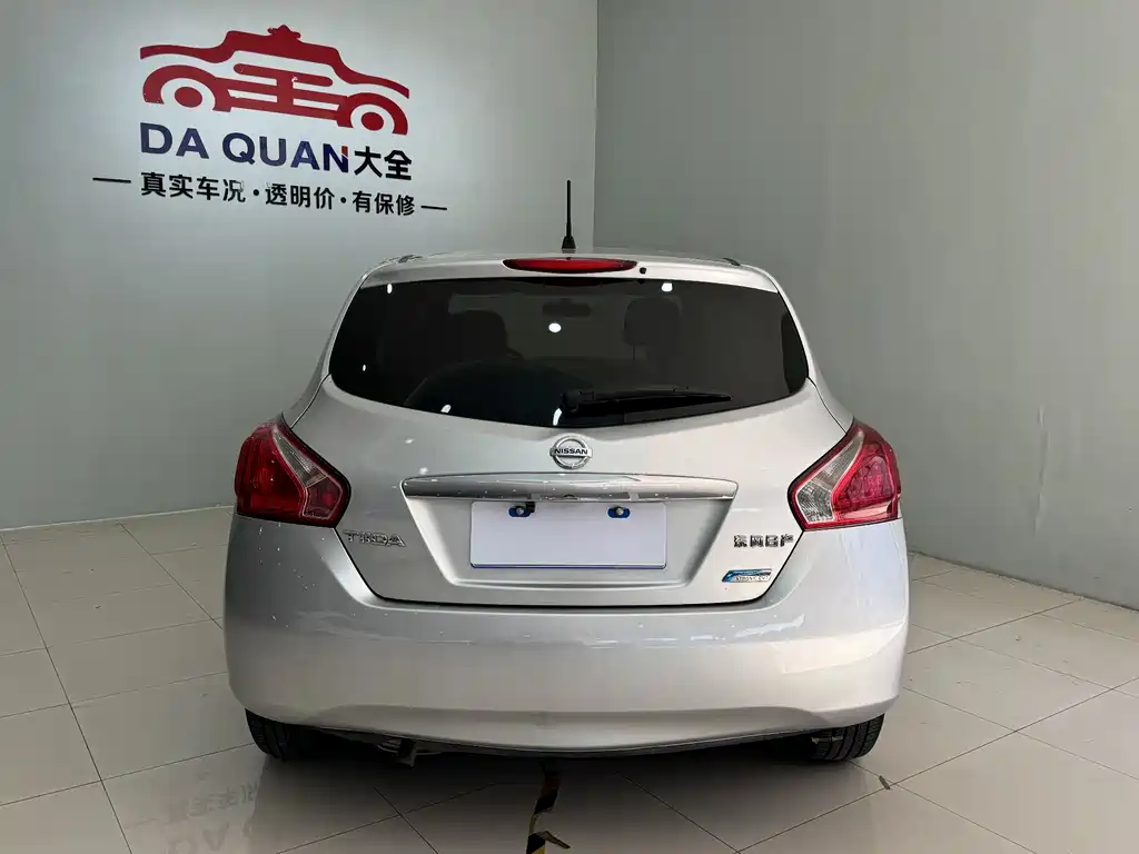 Nissan Tiida 2014 — фото 17