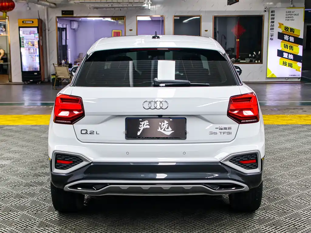 Audi Q2L 2022 — фото 23