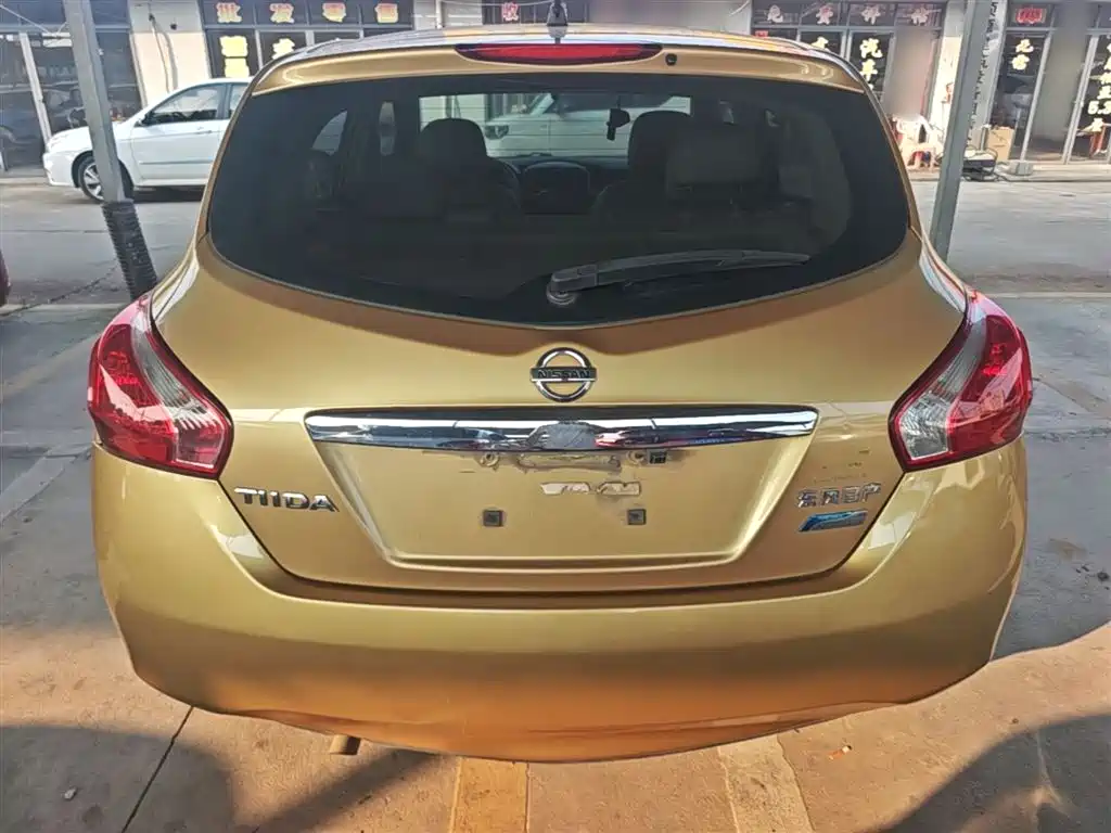 Nissan Tiida 2016 — фото 6