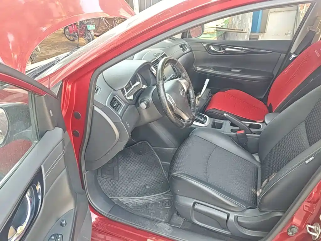 Nissan Tiida 2018 — фото 16