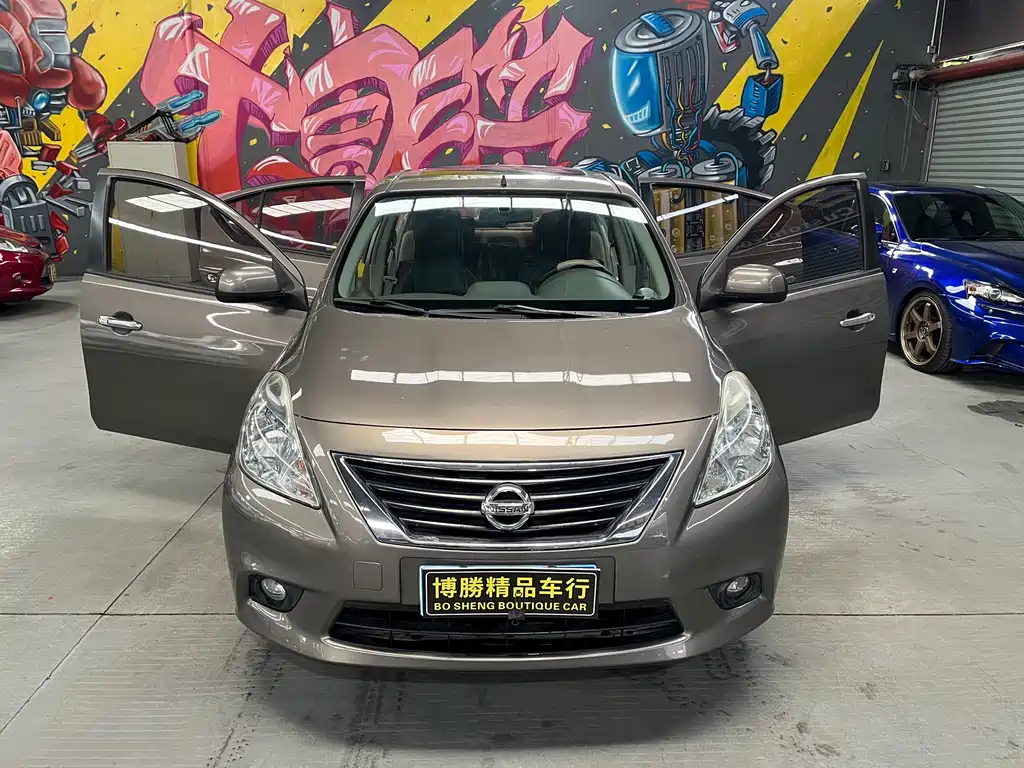 Nissan Sunny 2012 — фото 2