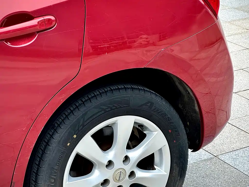 Nissan Tiida 2014 — фото 14