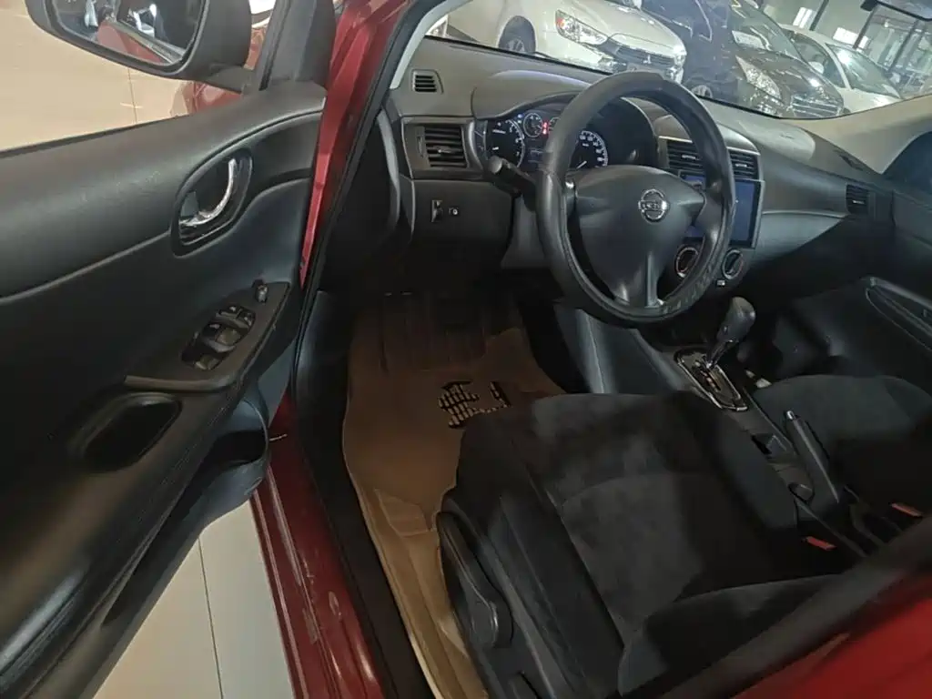 Nissan Tiida 2015 — фото 16