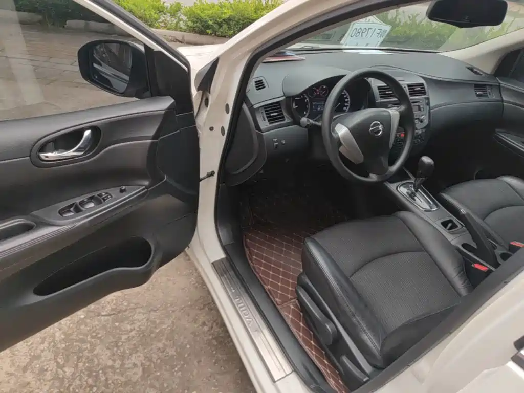 Nissan Tiida 2015 — фото 16
