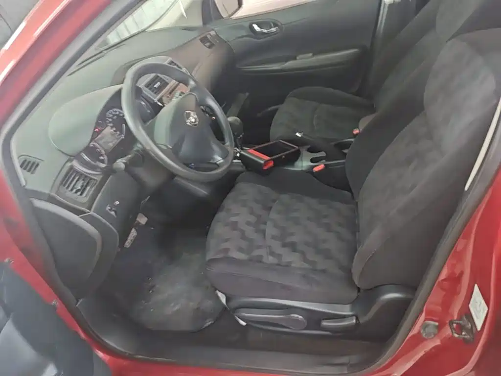 Nissan Tiida 2015 — фото 15