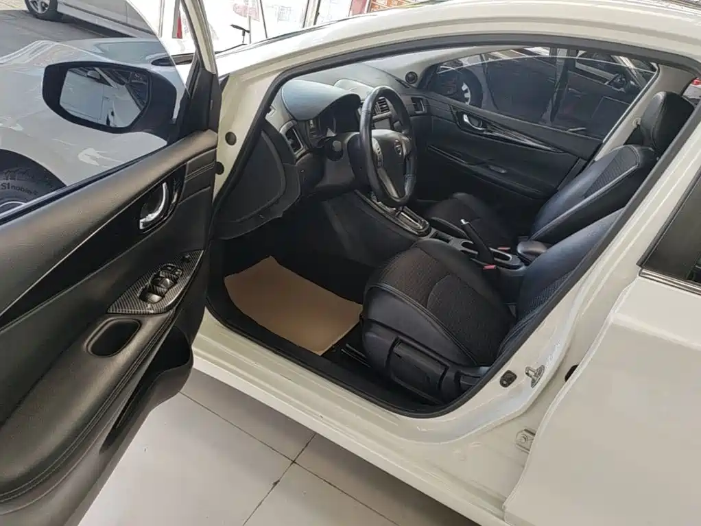 Nissan Tiida 2018 — фото 16