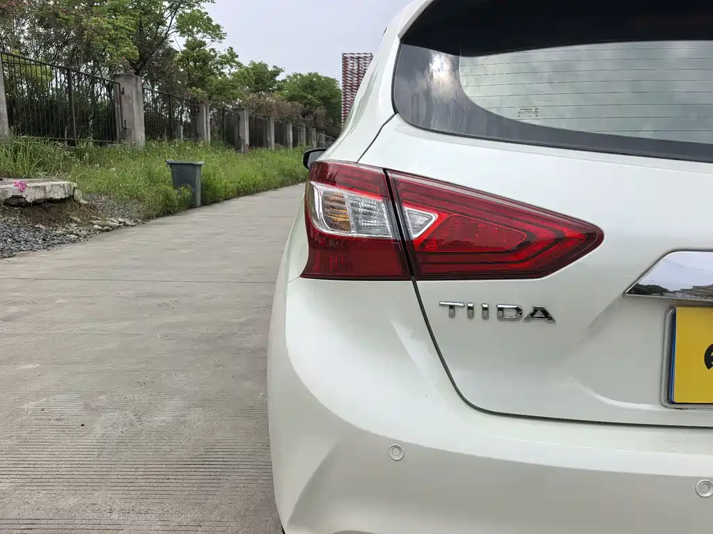 Nissan Tiida 2016 — фото 16