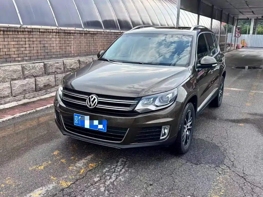 Volkswagen Tiguan 2013 — фото 1