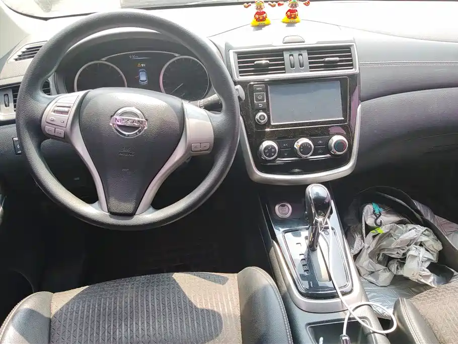 Nissan Tiida 2017 — фото 12