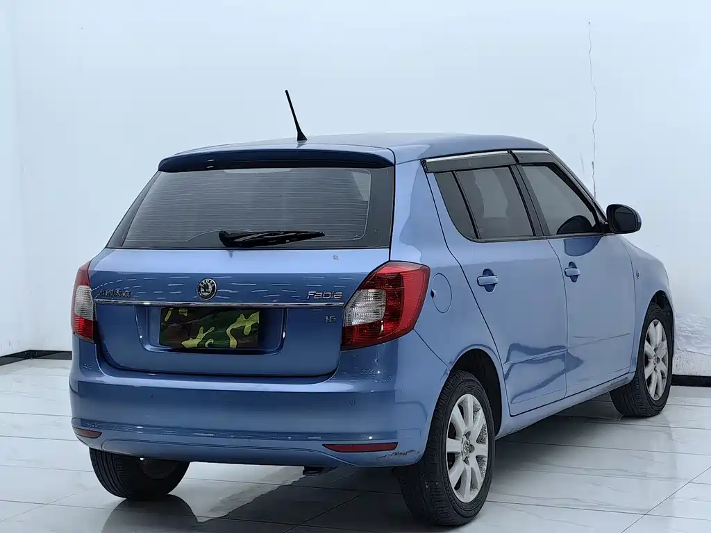 Skoda Fabia 2013 — фото 14