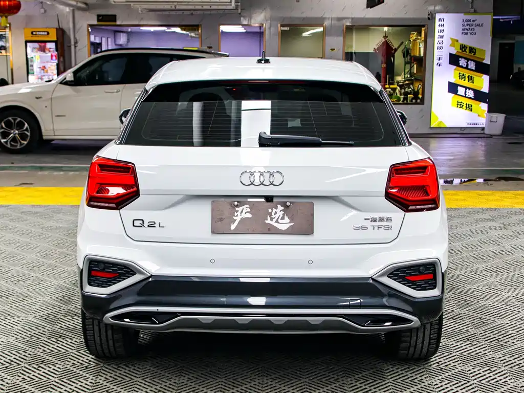 Audi Q2L 2022 — фото 22