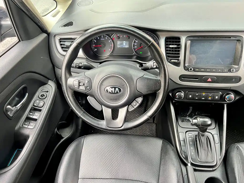 Kia Carens 2014 — фото 10