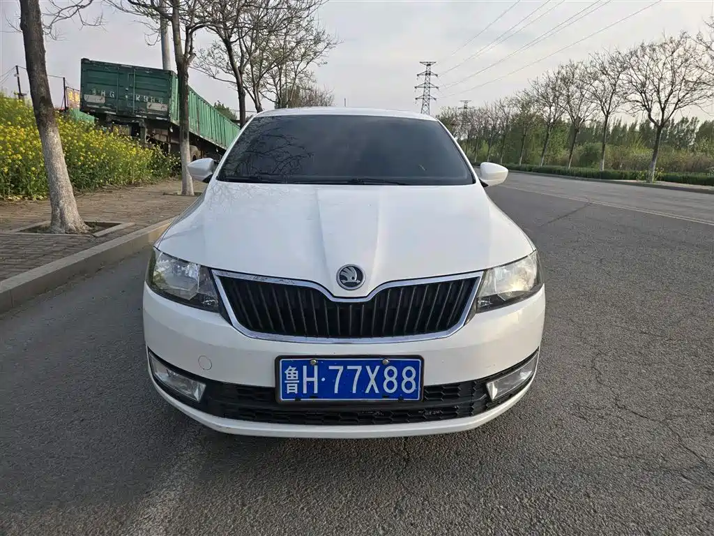 Skoda Rapid 2014 — фото 2