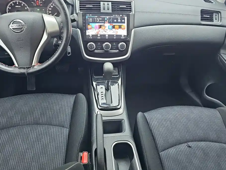 Nissan Tiida 2016 — фото 16