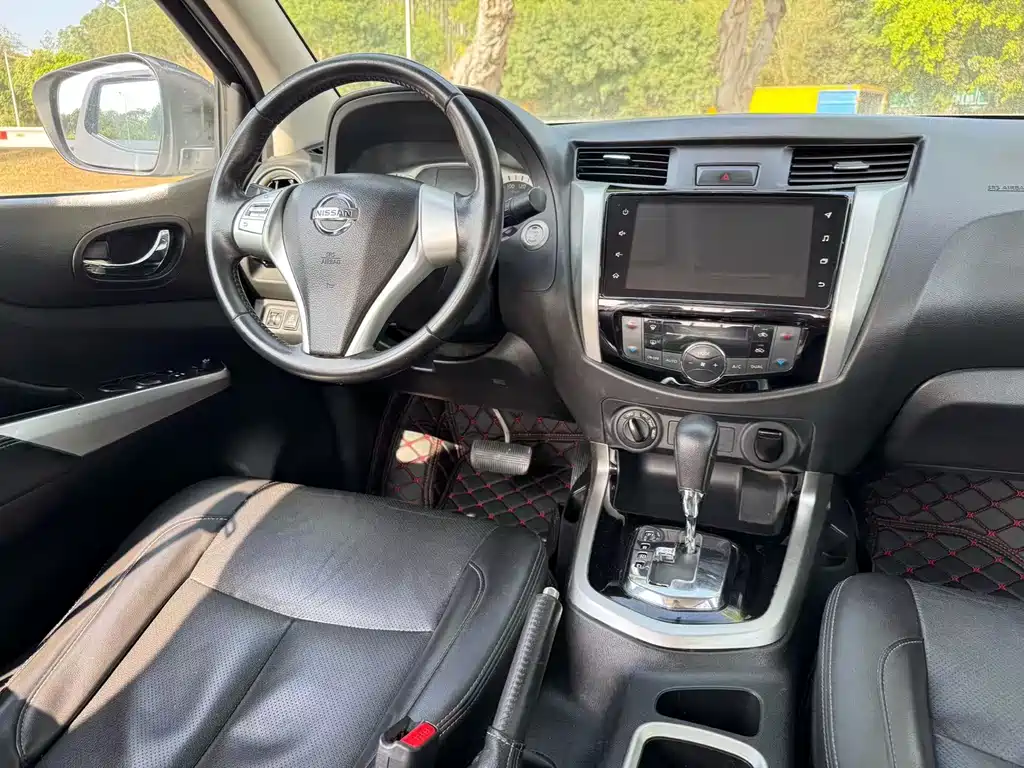 Nissan Navara 2022 — фото 18