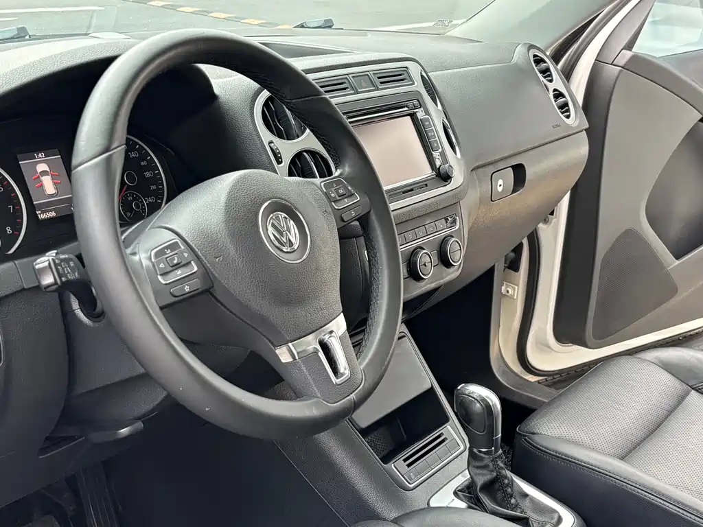 Volkswagen Tiguan 2013 — фото 11