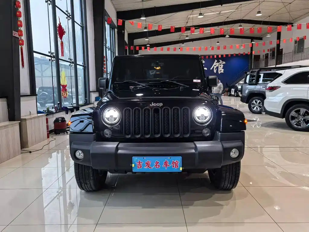 Jeep Wrangler 2014 — фото 2