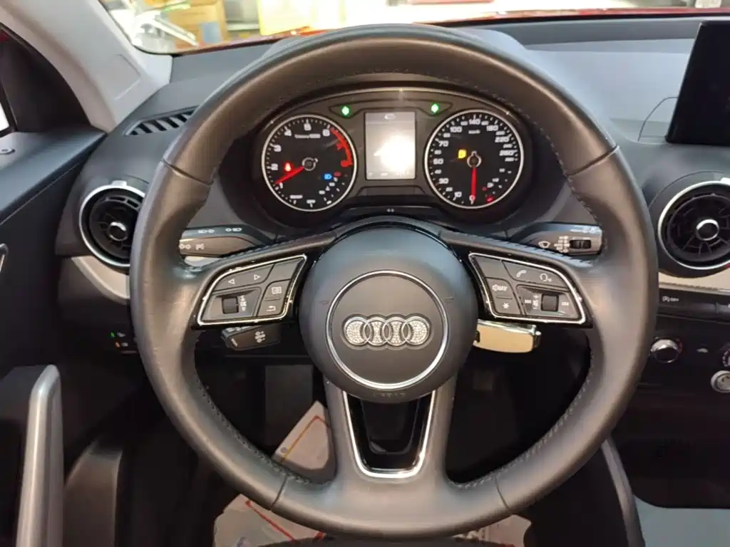 Audi Q2L 2021 — фото 11