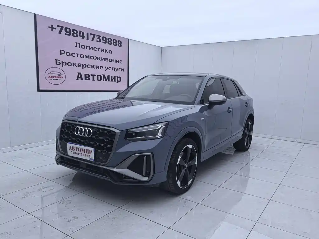 Audi Q2L 2022 — фото 1