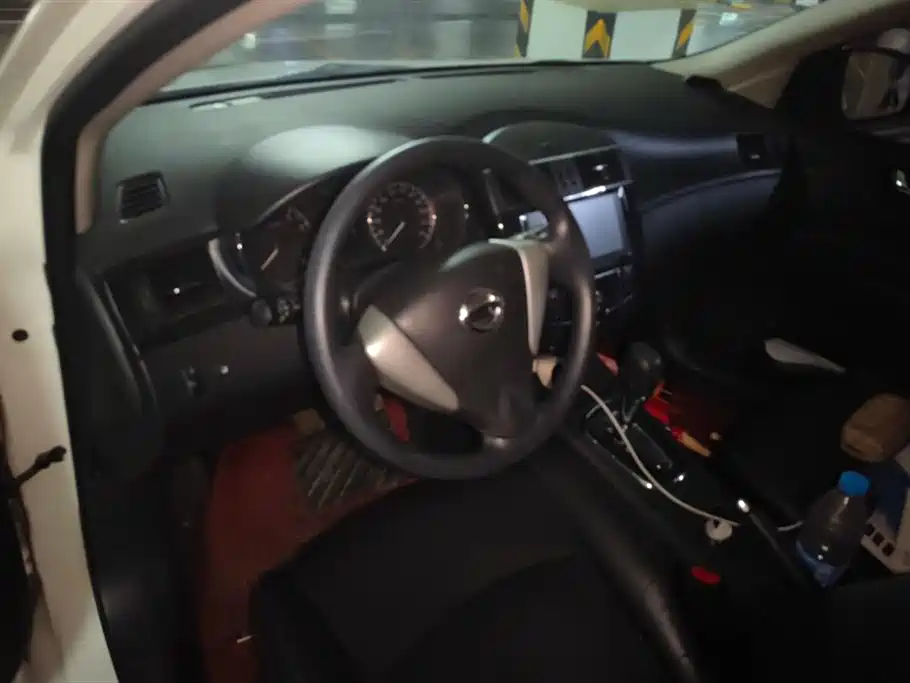 Nissan Tiida 2015 — фото 12
