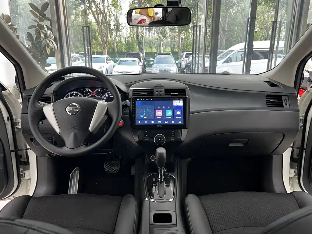Nissan Tiida 2015 — фото 14