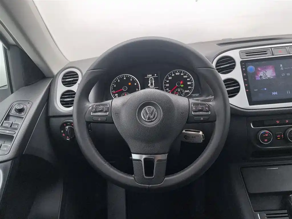 Volkswagen Tiguan 2014 — фото 11