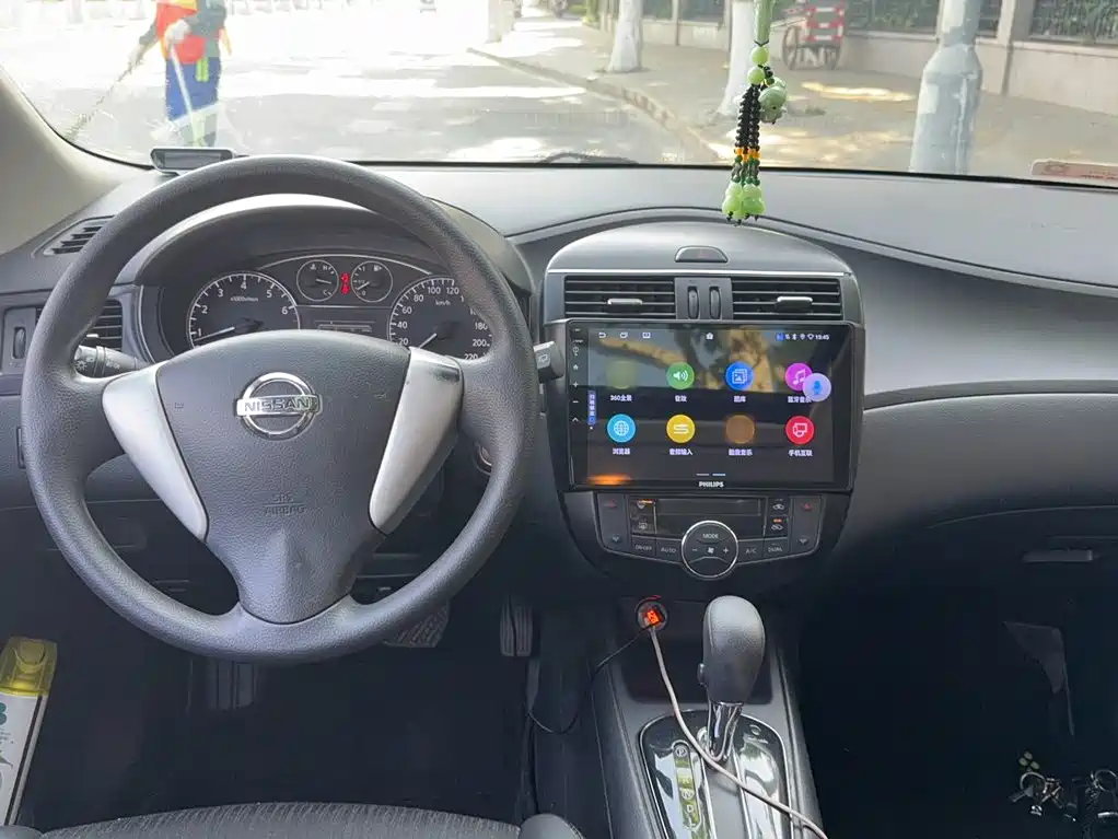 Nissan Tiida 2016 — фото 15