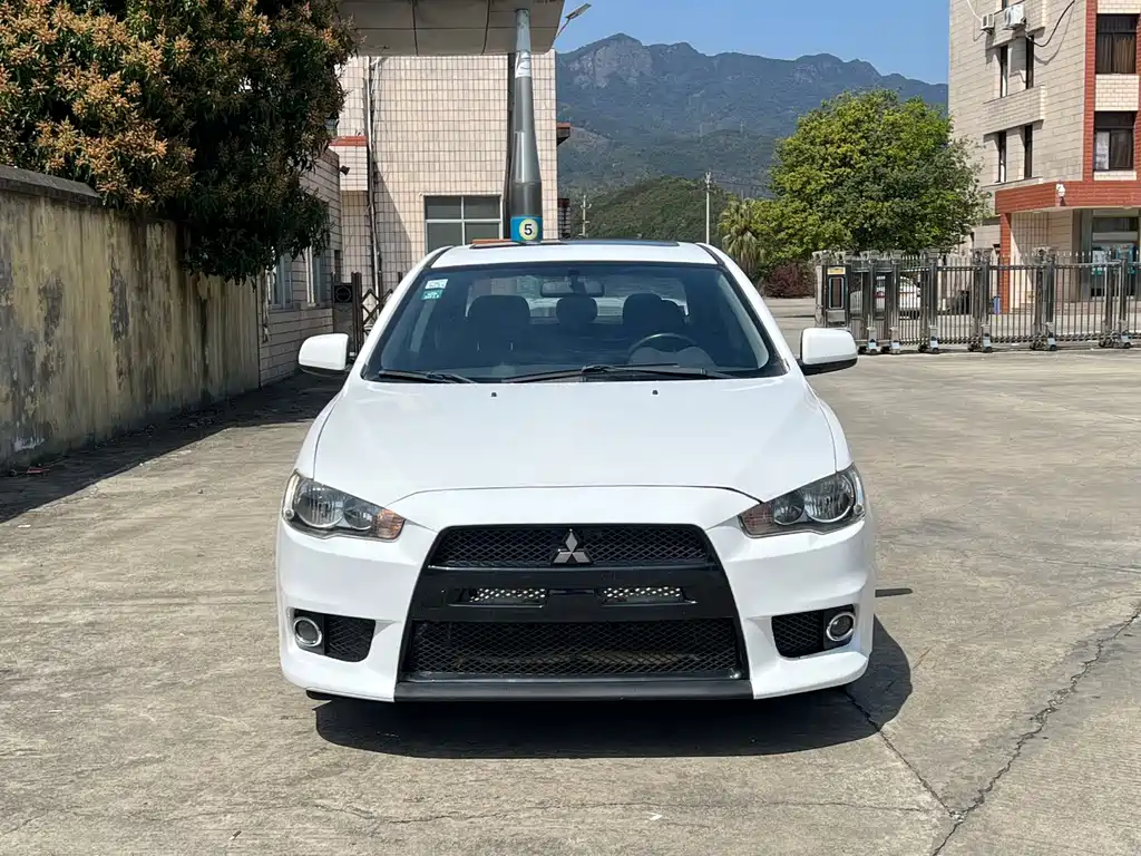 Mitsubishi Lancer EX 2013 — фото 2