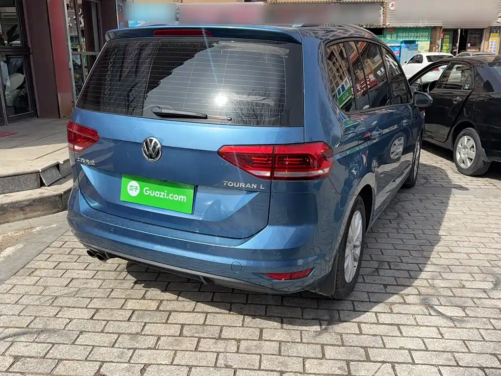 Volkswagen Touran 2018 — фото 12