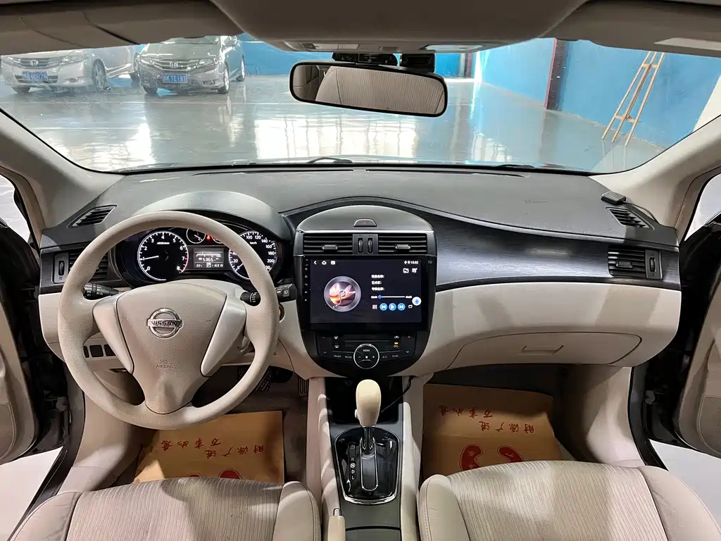 Nissan Tiida 2015 — фото 5