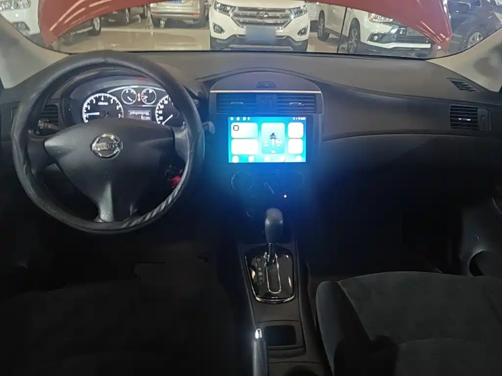 Nissan Tiida 2015 — фото 10