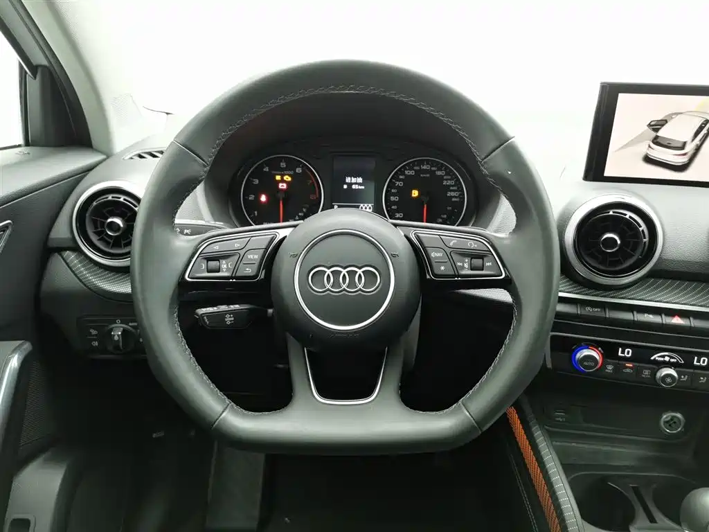 Audi Q2L 2023 — фото 11