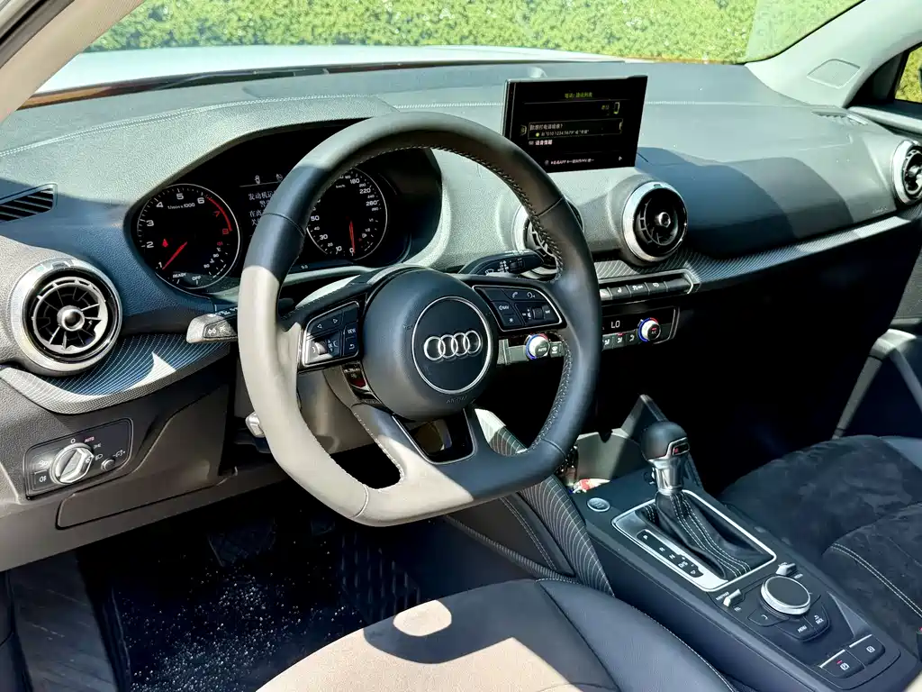 Audi Q2L 2022 — фото 17