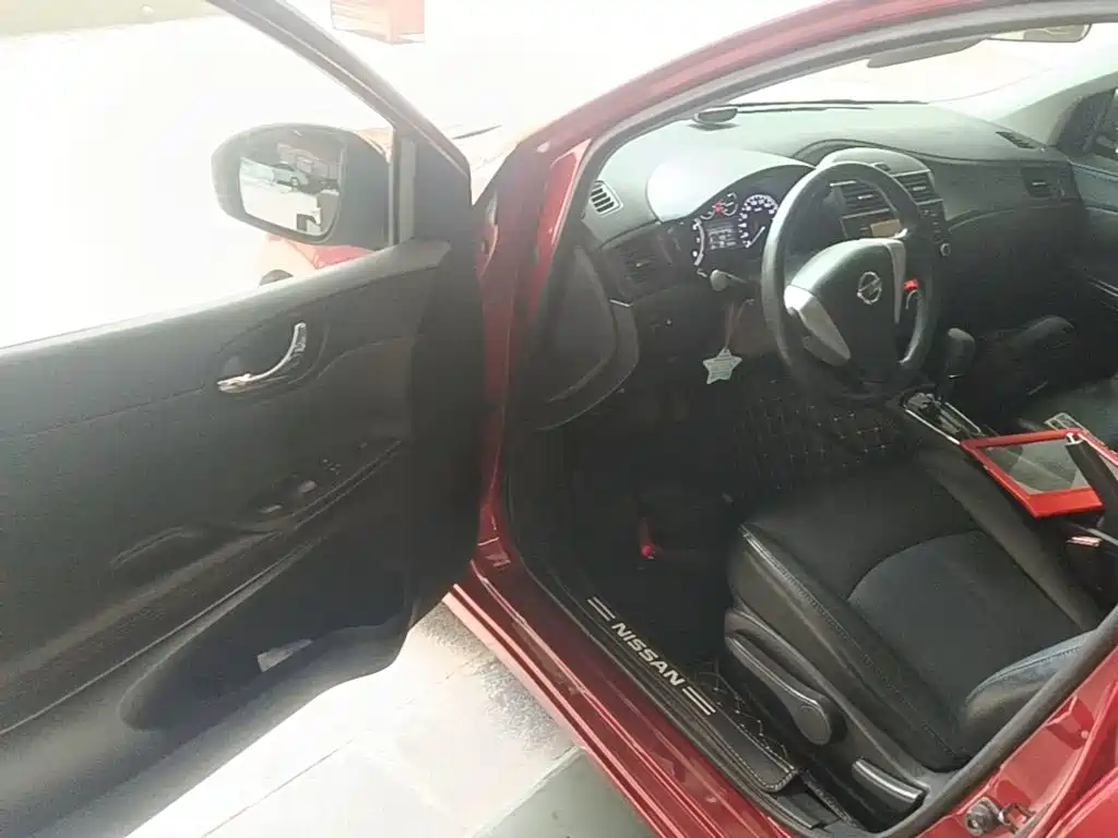 Nissan Tiida 2014 — фото 16