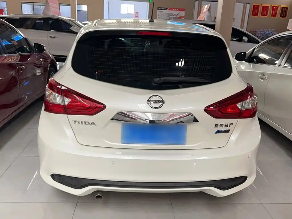 Nissan Tiida 2019 — фото 10