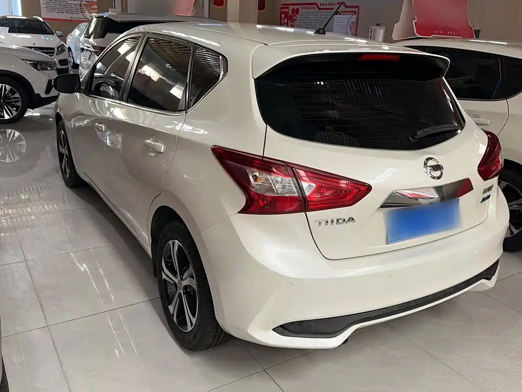 Nissan Tiida 2019 — фото 11