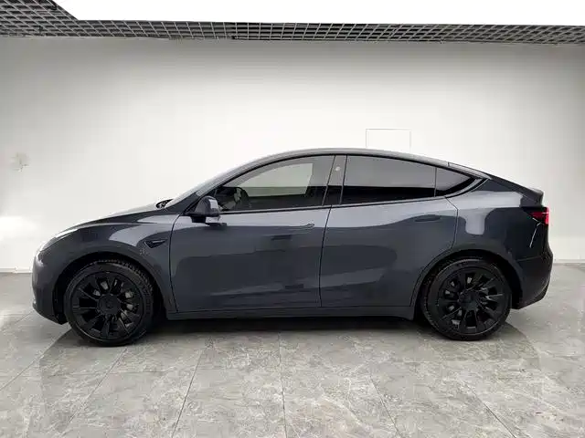 Tesla Model Y 2024 — фото 4